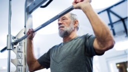 Elderly Man on Pullup Bar