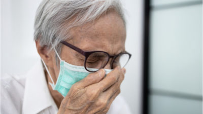 Elderly Person Coughing