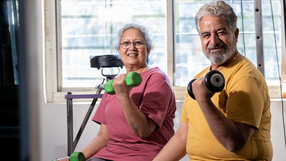 Older man and woman exercising