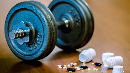 Dumbbell and pills